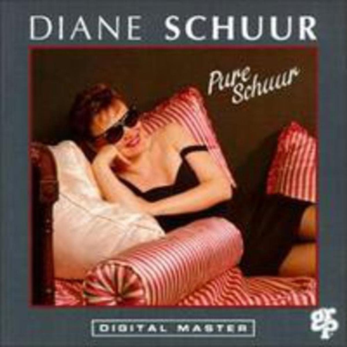 Pure Schuur [Audio CD] Diane Schuur; Bobby Womack; Dan Higgins; Marc Hugenberger; Maurice Spears; Neil Stubenhaus; Oscar Brashear; Richard Hyde; Andr  Fischer; Garnett Brown; Dick Hyde; Ernie Fields Jr.; Sal Marquez; Joel Peskin; Kim Hutchc.. - Very Good