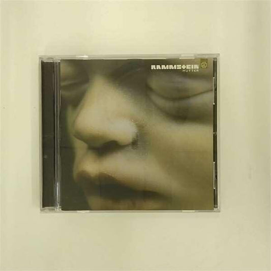 Mutter [Audio CD] Rammstein; Richard Z. Kruspe; Richard Kruspe; Till Lindemann and Oliver Riedel - Very Good