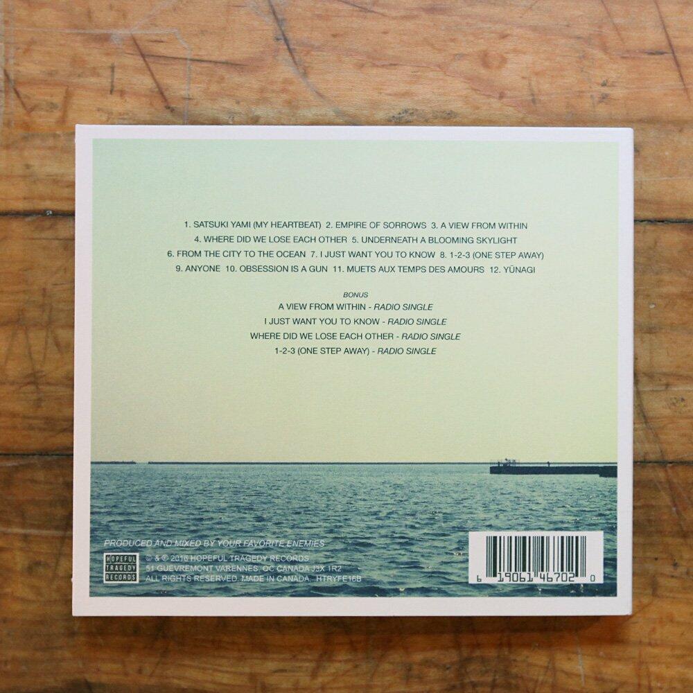 BETWEEN ILLNESS AND MIGRATION – DELUXE: TOKYO SESSIONS – CD 2016 [Audio CD] Your Favorite Enemies and .