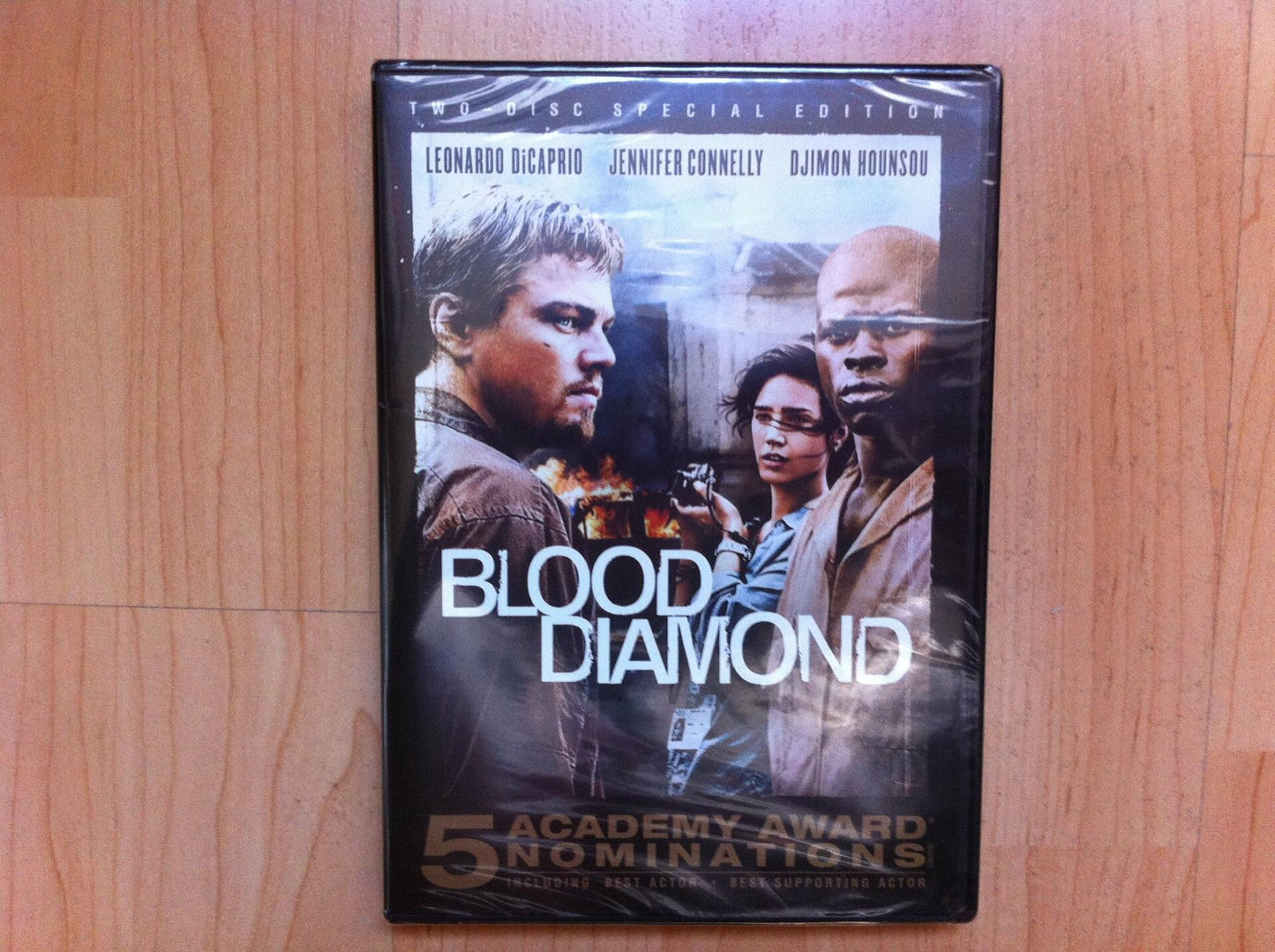 Blood Diamond (Two-Disc Special Edition) / Le Diamant de Sang (Edition Speciale de Deux Disques) [DVD] Leonardo DiCaprio; Djimon Hounsou; Jennifer Connelly; Kagiso Kuypers; Arnold Vosloo; Antony Coleman; Benu Mabhena; Anointing Lukola; Davi.. - Very Good