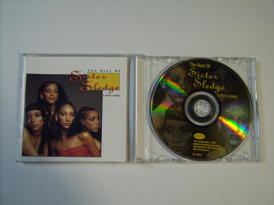 Best of 1973-1985 [Audio CD] Sister Sledge; Joni Sledge; David Simmons; Debbie Sledge; Kathy Sledge; Kim Sledge; Bernard Edwards; Smokey Robinson; Nile Rodgers; Bert de Coteaux; Silvester Levay; George Duke; Michael Kunze and Narada Michael.. - Very Good